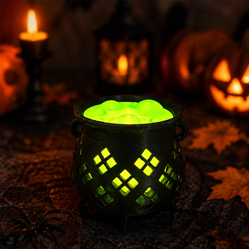 🔮 Hollow‑Cut Witch Cauldron LED Tea‑Light Lamp, Spooky Halloween Tabletop Decor Ornament